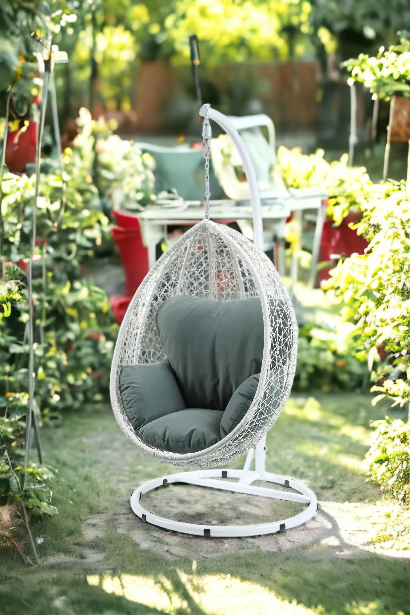 38 Black Metal Swing Chair With Beige Cushion